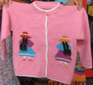 Pink Strickjacke mit peruanischen Frauen, Alpakawolle