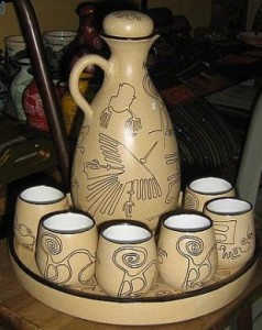 Ceramic carafe and 6 cups in a set with Inca sign decoration