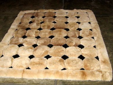 Alpaca fur rug with small diamond designs